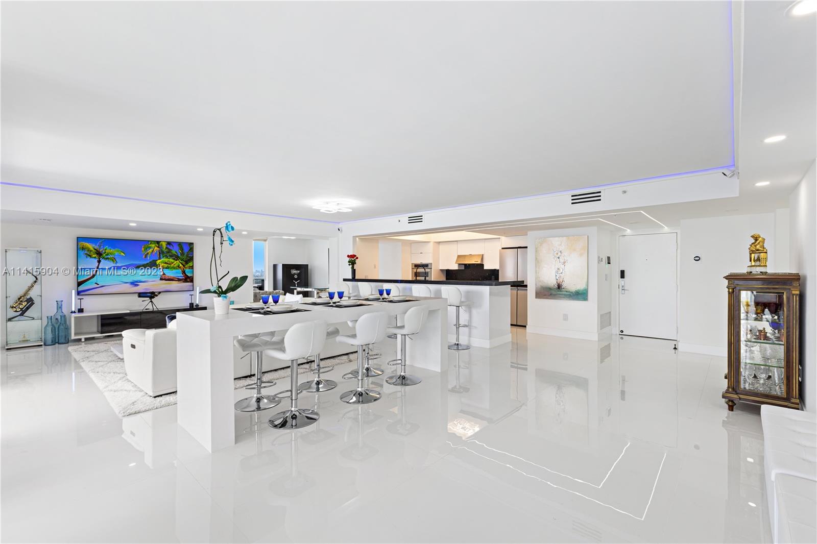 Miami Beach Miami Beach, FL 33139 - Photo 6 of 41 a living room with furniture and a flat screen tv