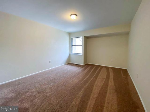 a view of small space with racks on the wall