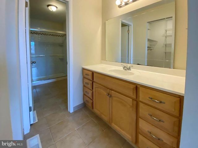 a view of a balcony with wooden floor