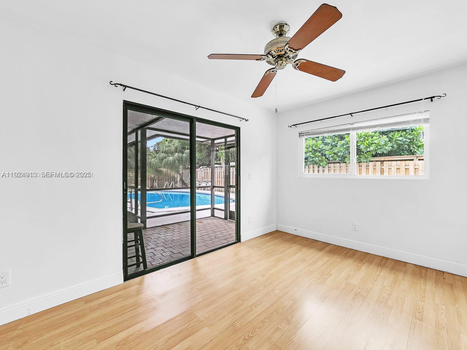 2620 Northeast 19th Street Pompano Beach, FL 33062 - Photo 29 of 42 a view of an empty room with a window