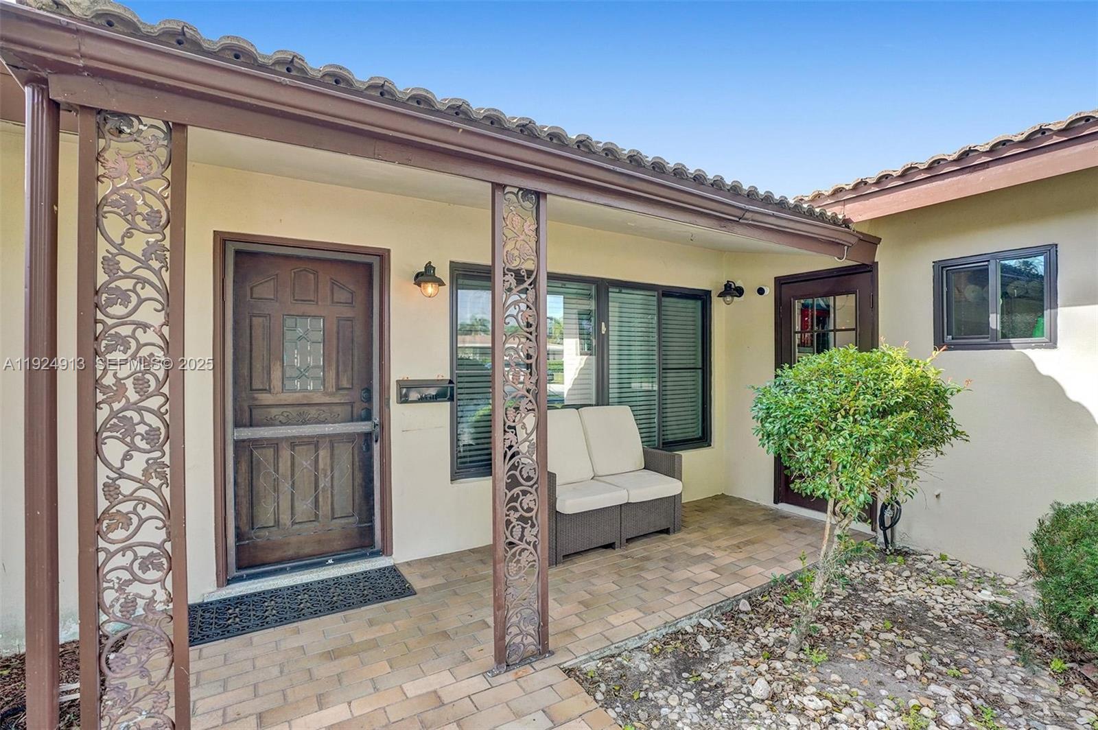 2620 Northeast 19th Street Pompano Beach, FL 33062 - Photo 39 of 42 a view of entryway front of house
