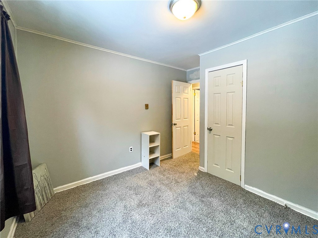 3867 Longview Road Kenbridge, VA 23944 - Photo 15 of 25 an empty room with closet and cabinet