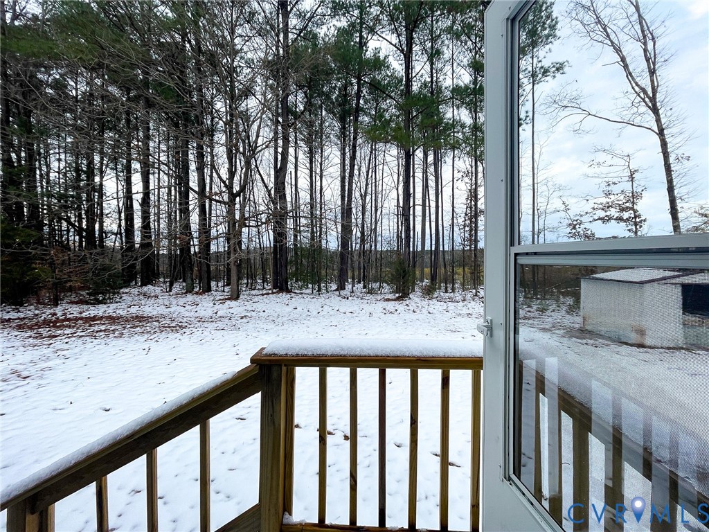 3867 Longview Road Kenbridge, VA 23944 - Photo 24 of 25 a view of backyard with wooden fence and trees