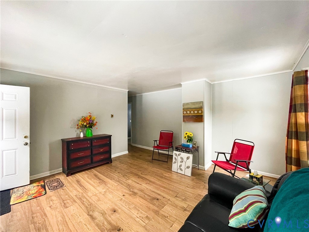 3867 Longview Road Kenbridge, VA 23944 - Photo 5 of 25 a living room with furniture and wooden floor