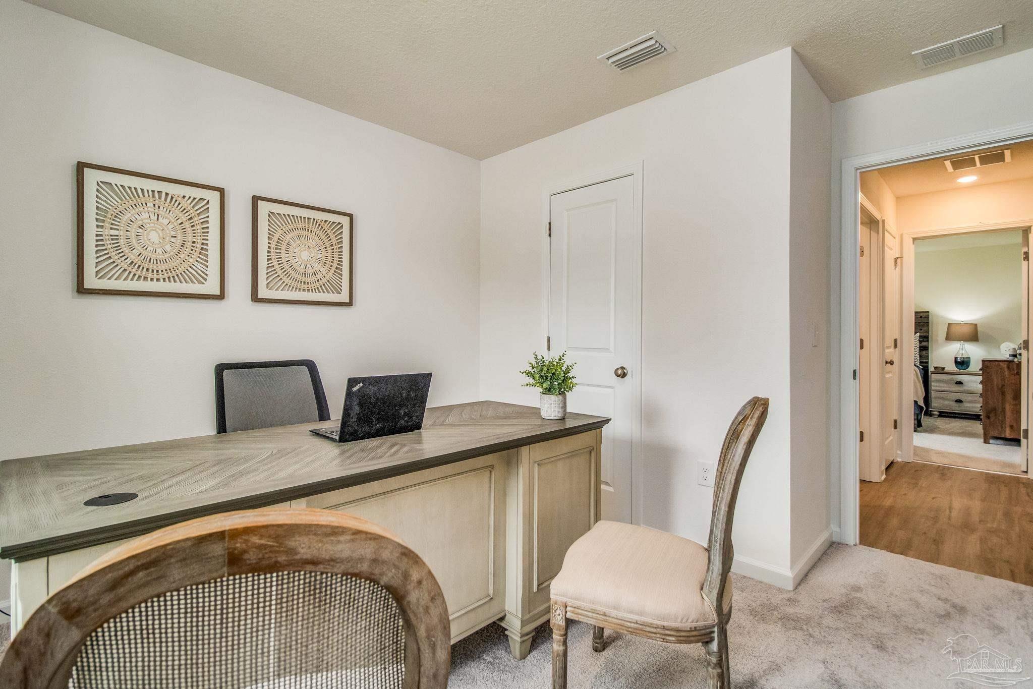 5454 Horizons Edge Lane Milton, FL 32583 - Photo 26 of 27 a bedroom with a bed and furniture