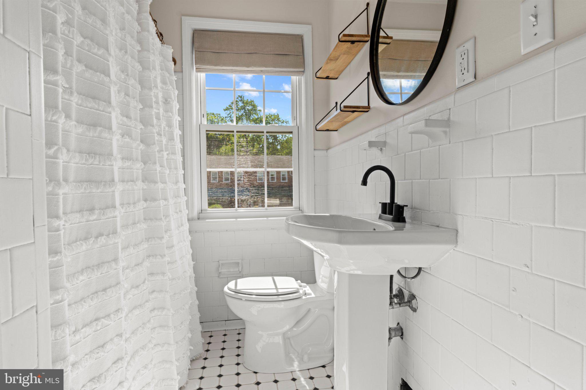 1855 Edgewood Road Towson, MD 21286 - Photo 21 of 29 Bright and airy modern bathroom retreat.