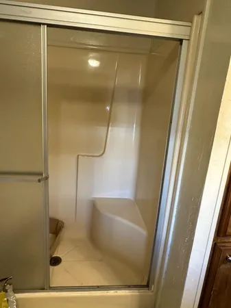 a utility room with washer and dryer