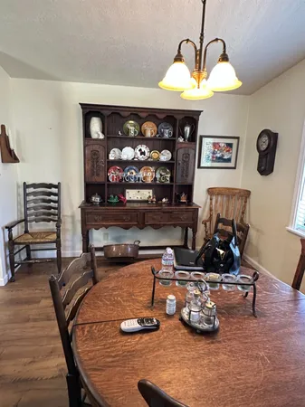 a room with furniture and a chandelier
