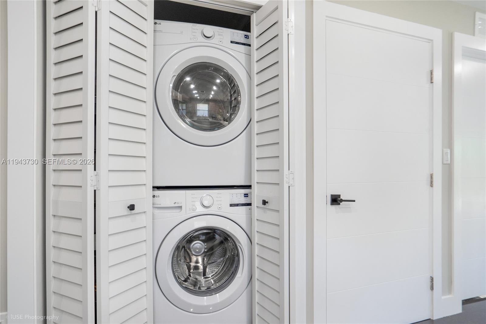 1035 Northwest 48th Street Miami, FL 33127 - Photo 22 of 29 a utility room with dryer and washer