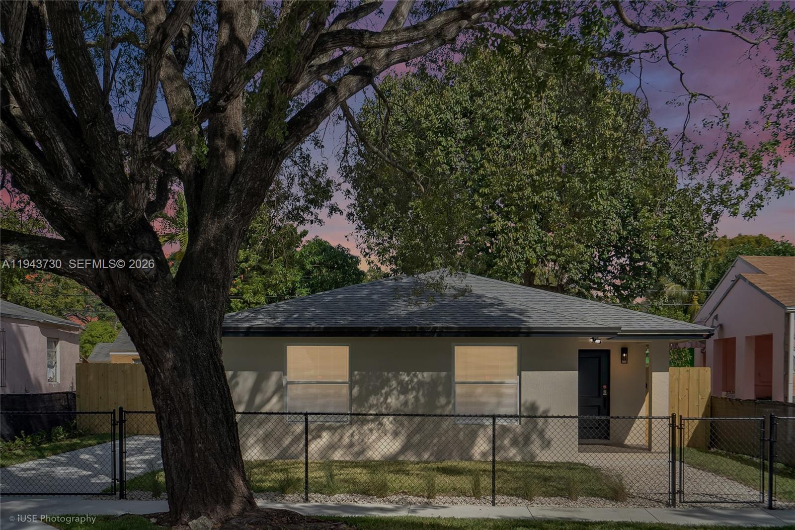 1035 Northwest 48th Street Miami, FL 33127 - Photo 29 of 29 a backyard of a house with lots of green space