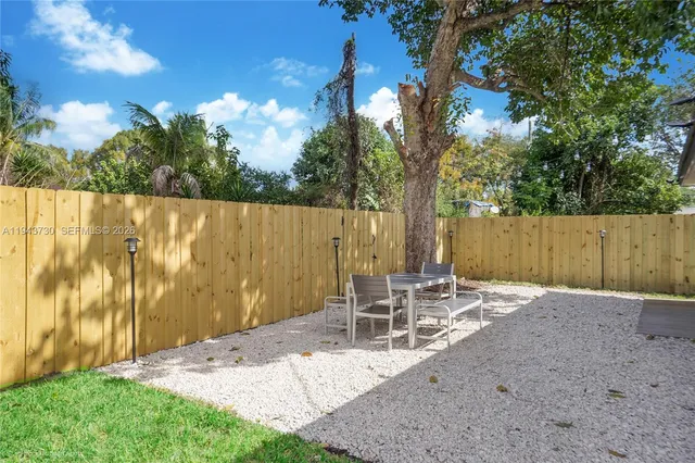 a view of outdoor space with seating area