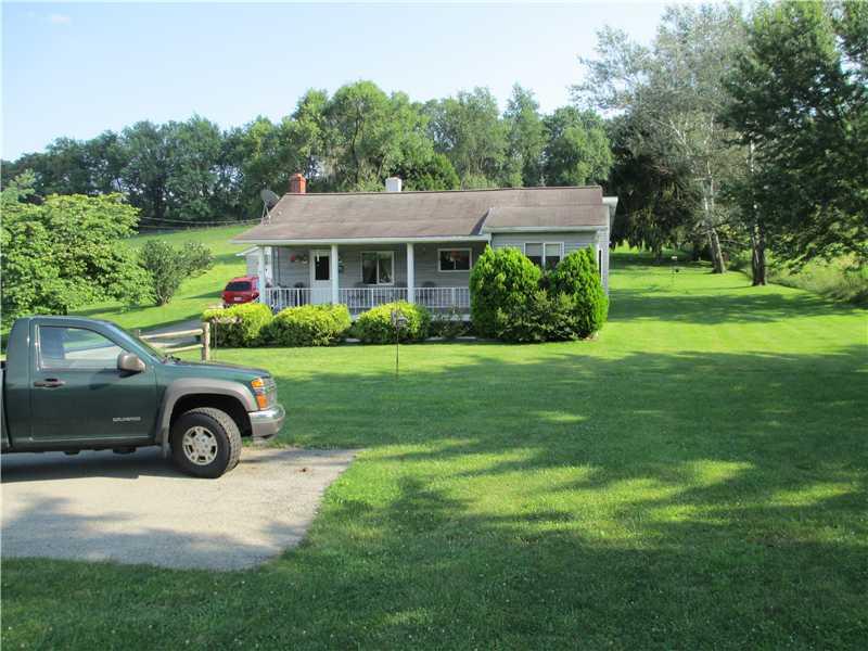 484 Flatwoods Road Vanderbilt, PA 15486 - Photo 20 of 20 Exterior Front. The house sits way back from Flatwoods Road and has extra parking out front for your guests!