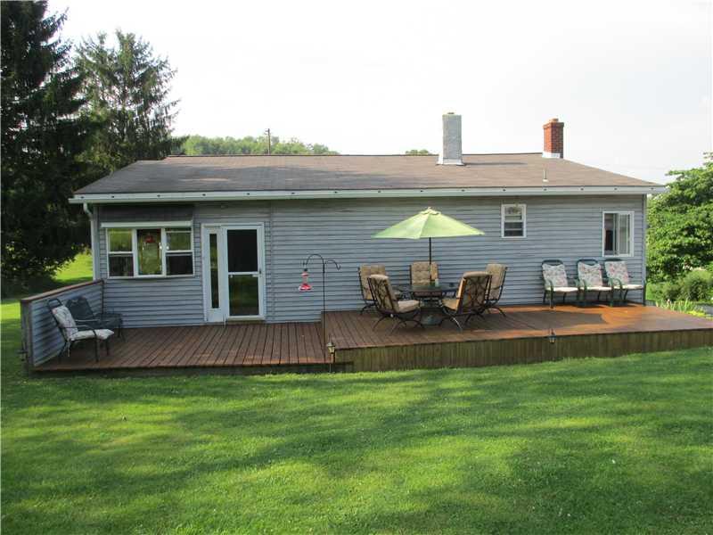 484 Flatwoods Road Vanderbilt, PA 15486 - Photo 3 of 20 Exterior Back. Large deck for entertaining family and friends just off the sunroom!