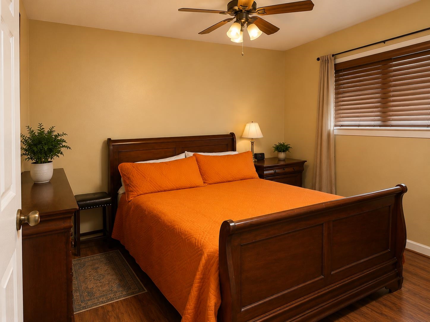 5845 Meadowview Road Beaumont, TX 77708 - Photo 15 of 24 a bed sitting in a bedroom next to a window