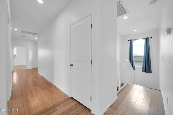 a utility room with sink dryer and washer