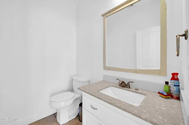 a bathroom with a bathtub a sink a vanity and a shower