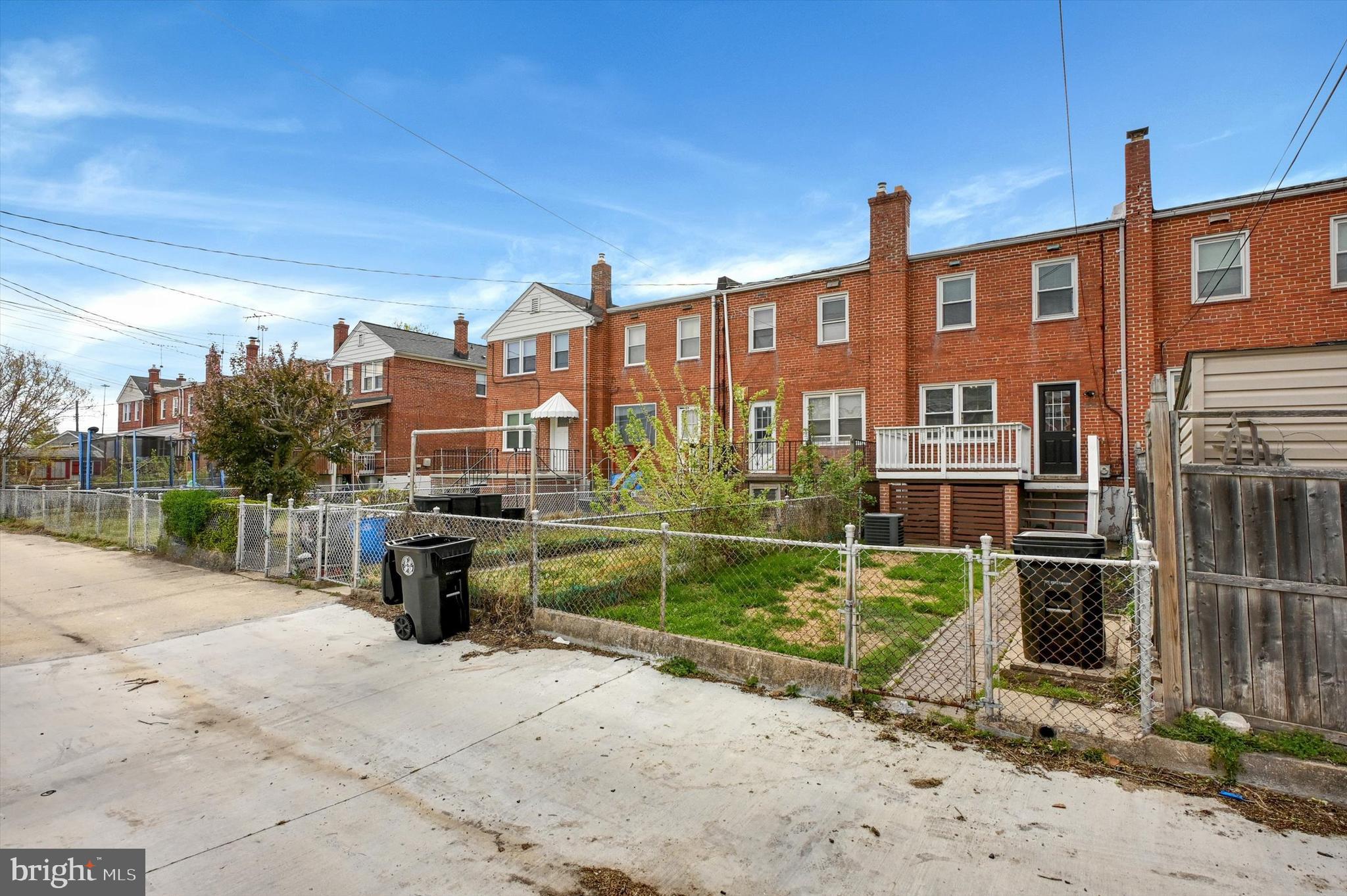 3521 Dunhaven Road Baltimore, MD 21222 - Photo 35 of 35 a view of a blue house with a yard