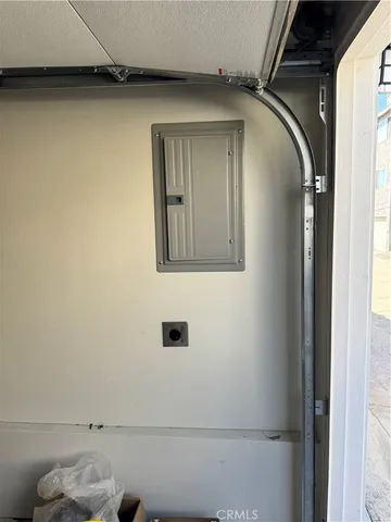 a view of livingroom with washer and dryer