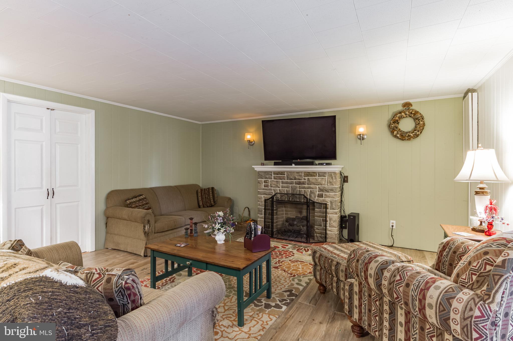 9824 Hardy Road Philadelphia, PA 19115 - Photo 23 of 31 Gas fireplace for cozy winter nights