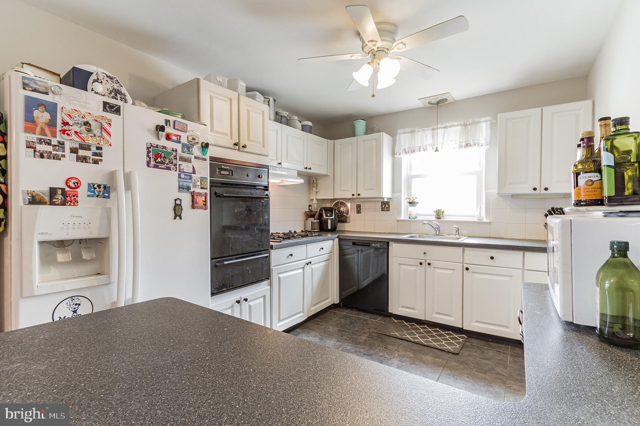 9824 Hardy Road Philadelphia, PA 19115 - Photo 10 of 31 Celing fan with light and plenty of counterspace