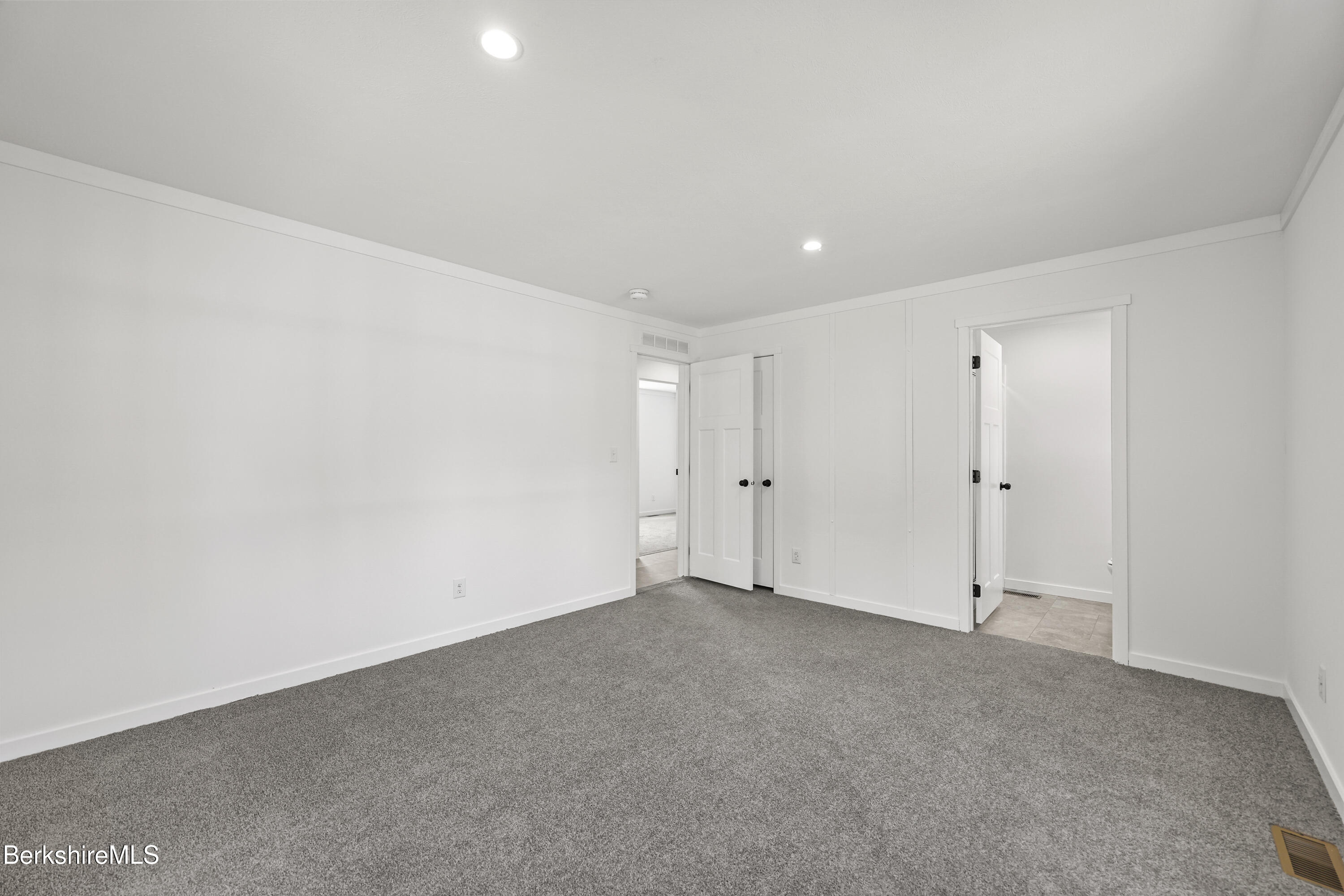395 Cheshire Road, Unit 102 Pittsfield, MA 01201 - Photo 19 of 28 a view of an empty room