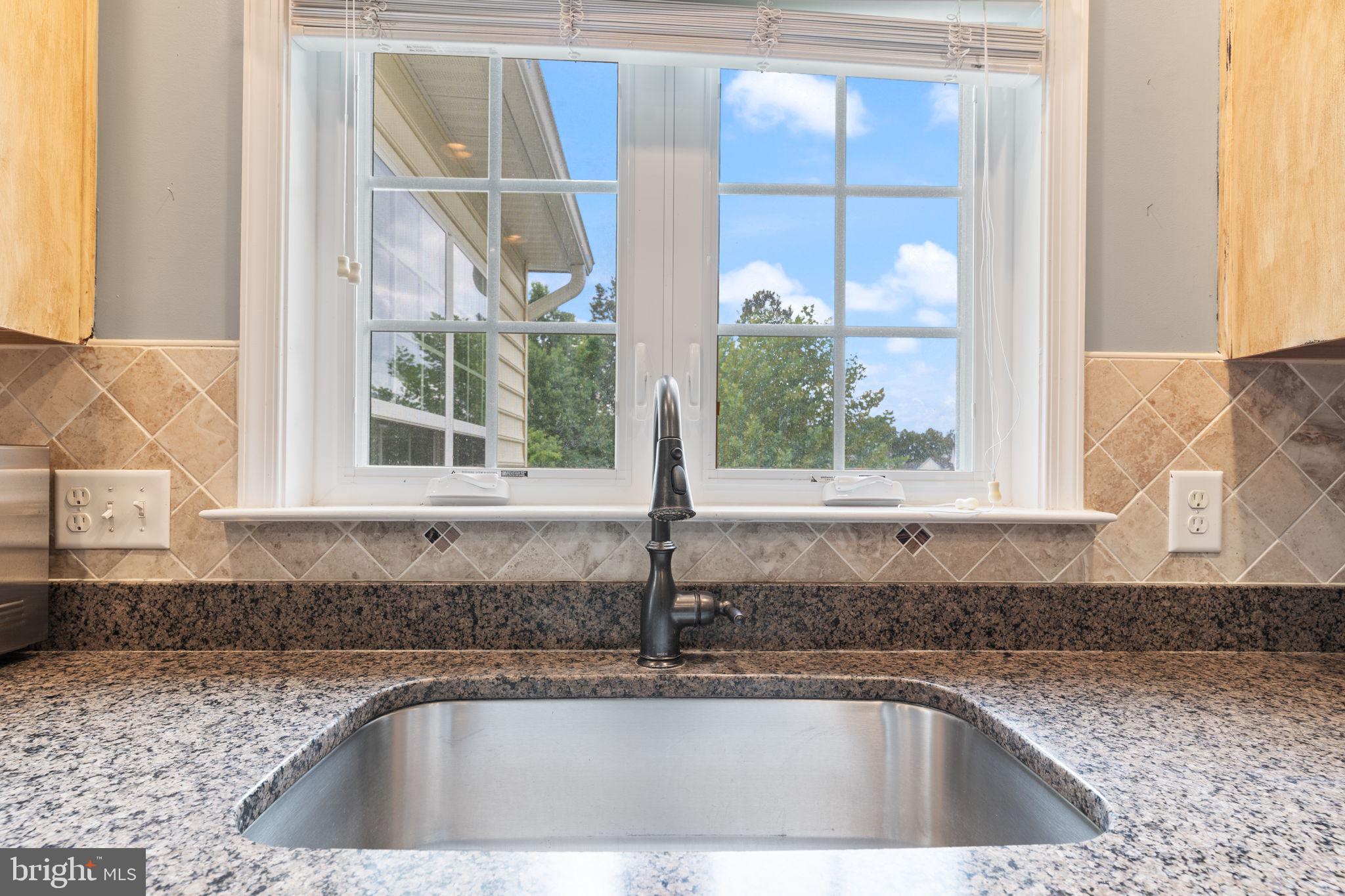 5270 Longbow Road King George, VA 22485 - Photo 34 of 75 Kitchen sink overlooking backyard