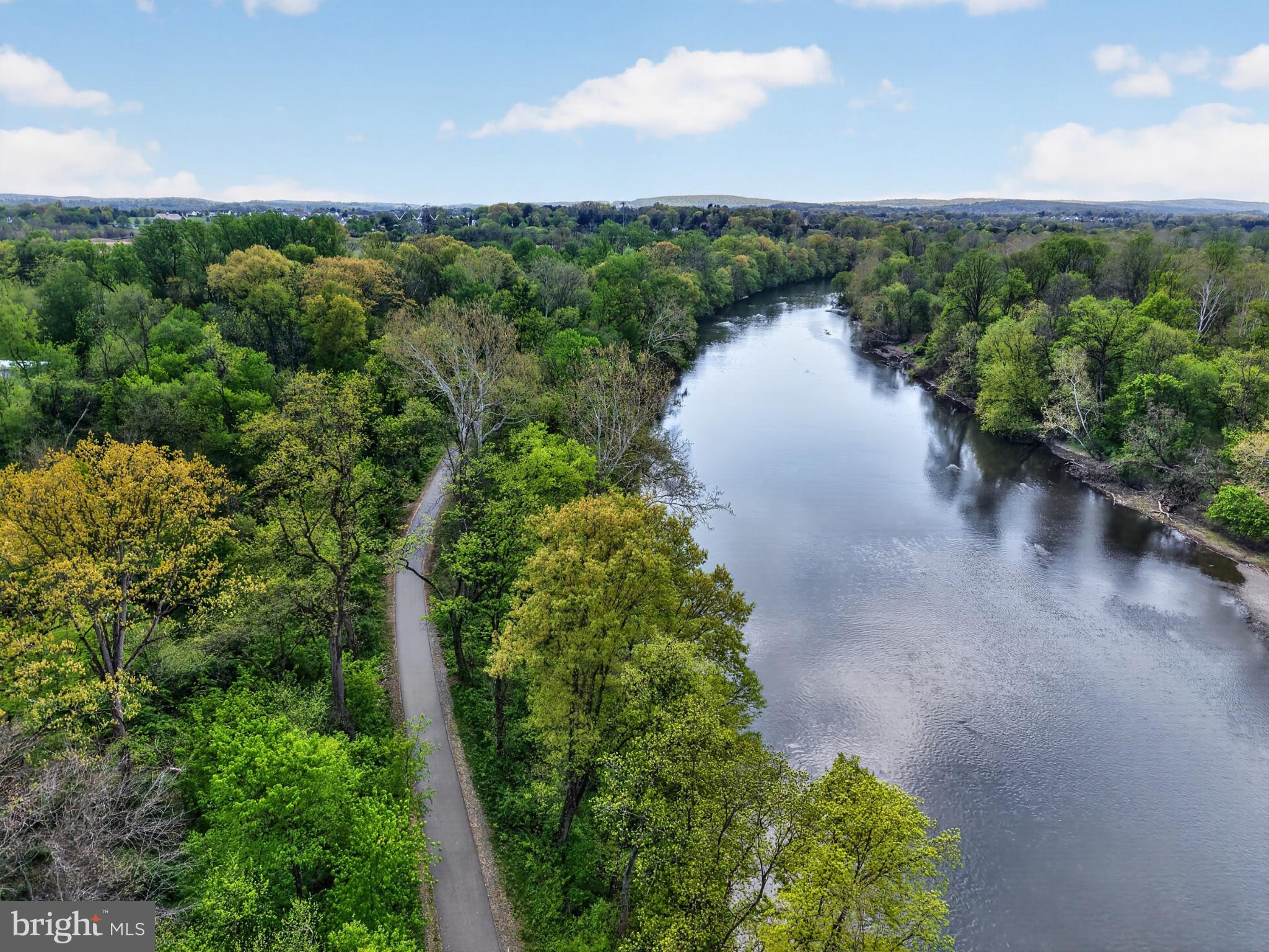 300 Sanatoga Road Pottstown, PA 19465 - Photo 66 of 79 Serene river winding through lush greens.