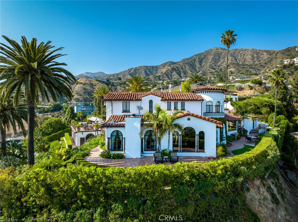 a view of a house with a swimming pool