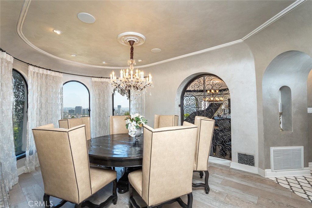 330 Kempton Road Glendale, CA 91202 - Photo 21 of 75 a view of a dining room with furniture and a chandelier