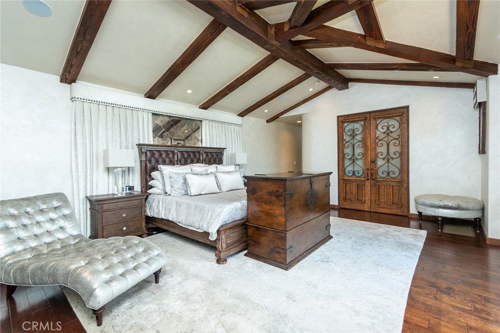 330 Kempton Road Glendale, CA 91202 - Photo 34 of 75 a bedroom with furniture and wooden floor