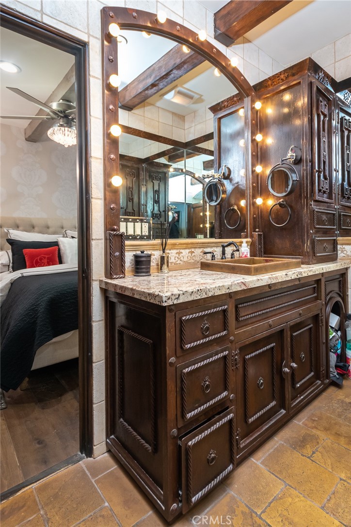 330 Kempton Road Glendale, CA 91202 - Photo 52 of 75 a room with a sink and a mirror