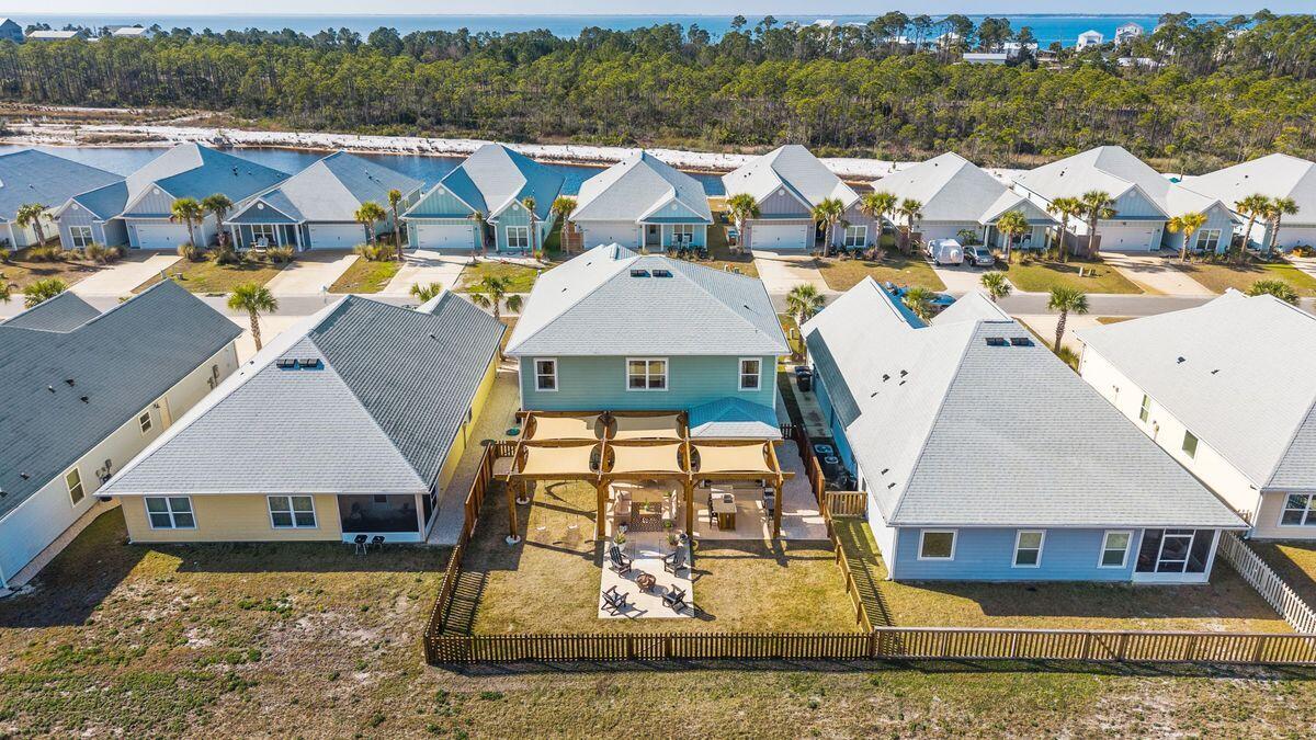 774 Backwater Road Port St. Joe, FL 32456 - Photo 3 of 65 an aerial view of a house with yard