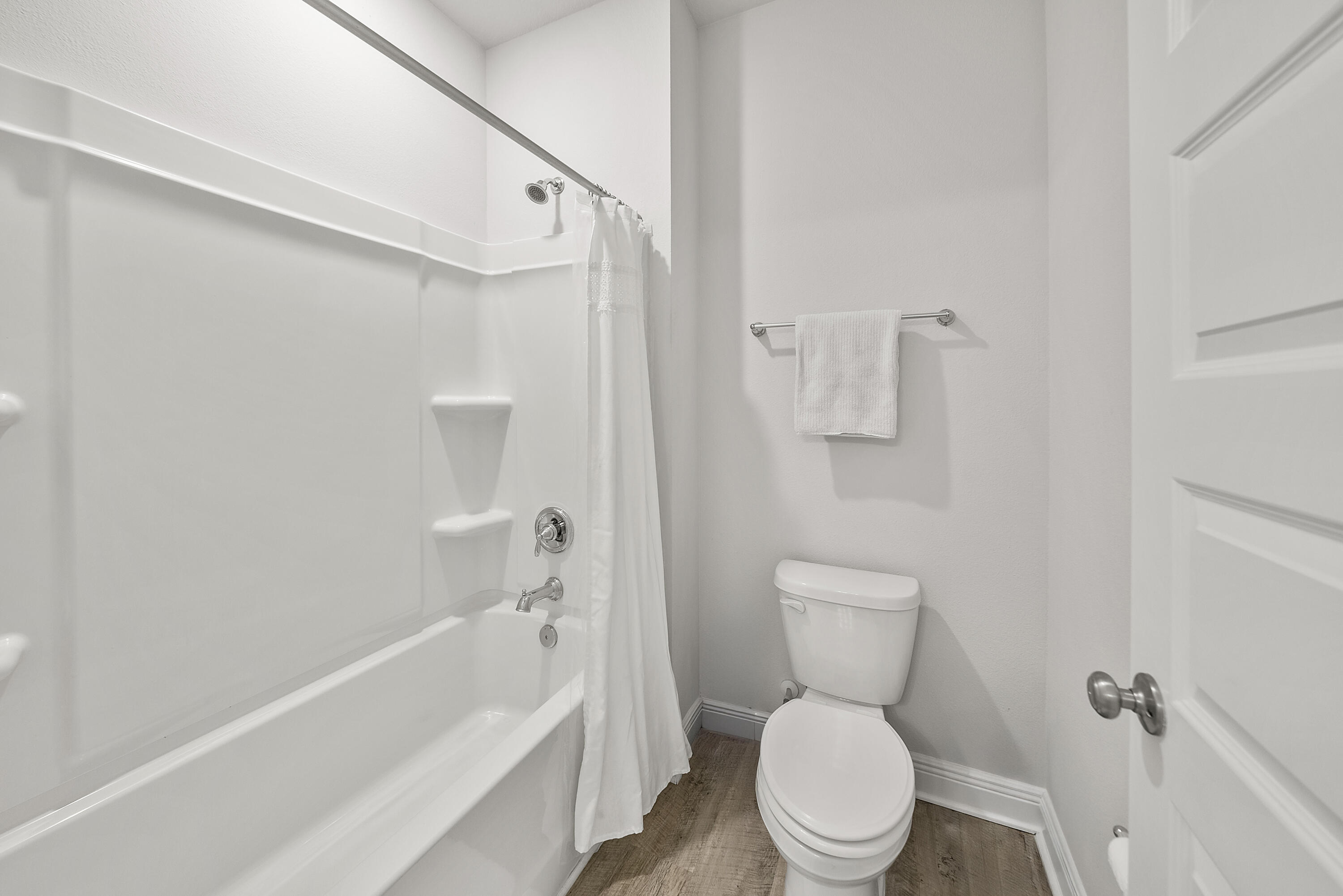 774 Backwater Road Port St. Joe, FL 32456 - Photo 35 of 65 a bathroom with a toilet and a bathtub