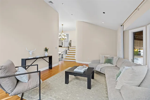 a bedroom with a bed and a desk