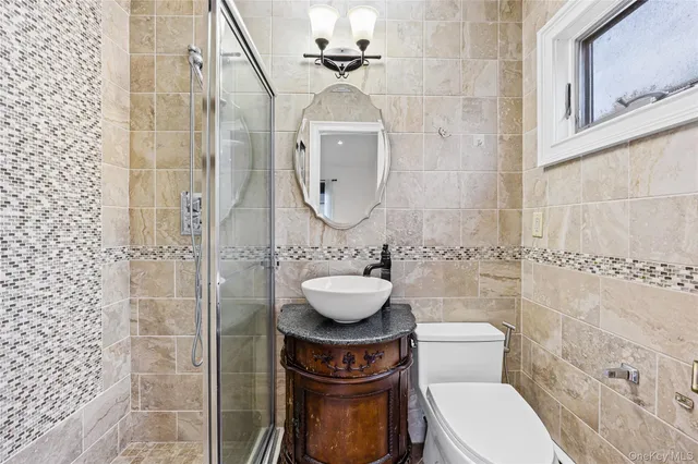 a view of entryway dining room and hall with wooden floor