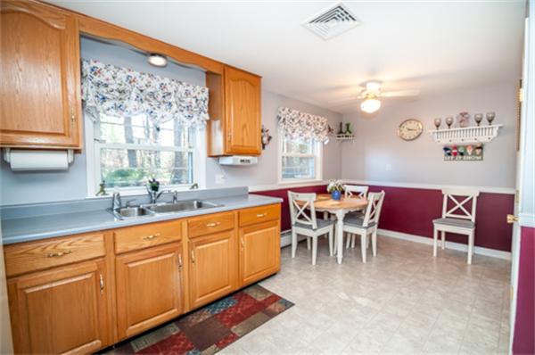 34 Rangeway Road Billerica, MA 01862 - Photo 7 of 30 a dining table with chairs and window
