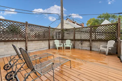 a view of a chairs and table on the wooden floor
