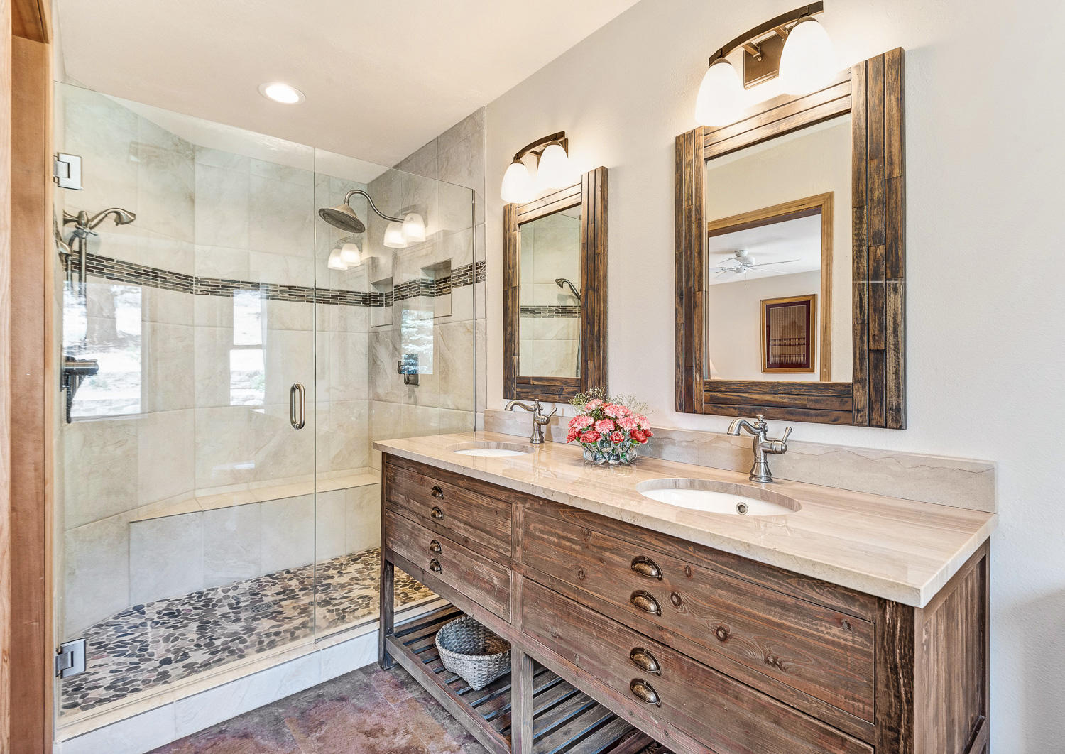 19310 Dayton Road Bend, OR 97703 - Photo 15 of 40 Recently remodeled master bath with marble countertop, tiled double-head shower.