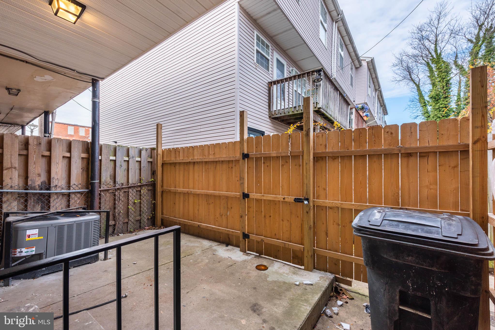 554 Gold Street Baltimore, MD 21217 - Photo 20 of 23 a view of a balcony with furniture