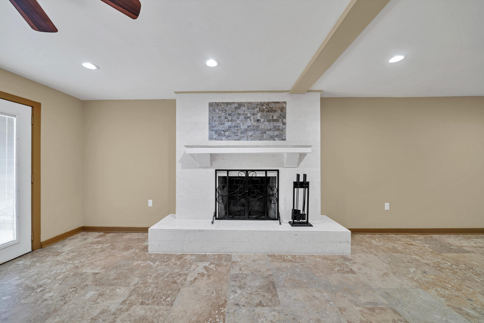 536 Benning Drive Destin, FL 32541 - Photo 20 of 46 an empty room with a fireplace and window
