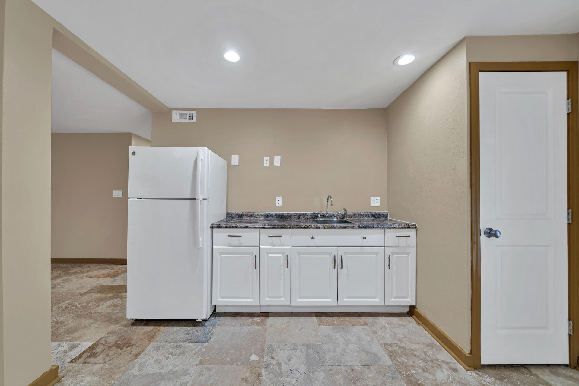 536 Benning Drive Destin, FL 32541 - Photo 21 of 46 a kitchen with a refrigerator and a stove