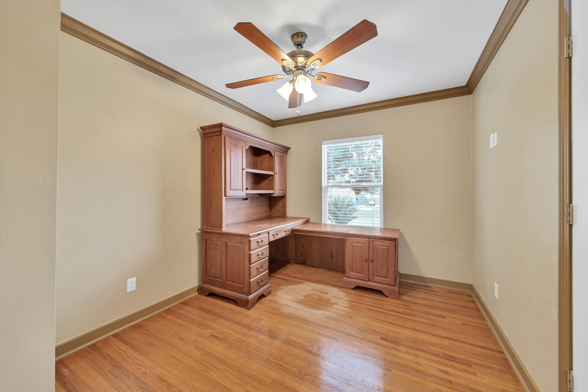 536 Benning Drive Destin, FL 32541 - Photo 24 of 46 a workspace with wooden floor and windows