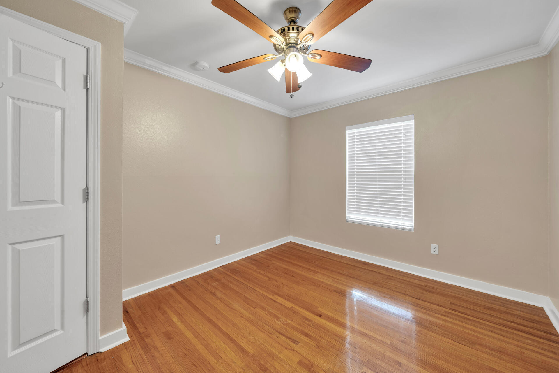 536 Benning Drive Destin, FL 32541 - Photo 35 of 46 wooden floor in an empty room with a window