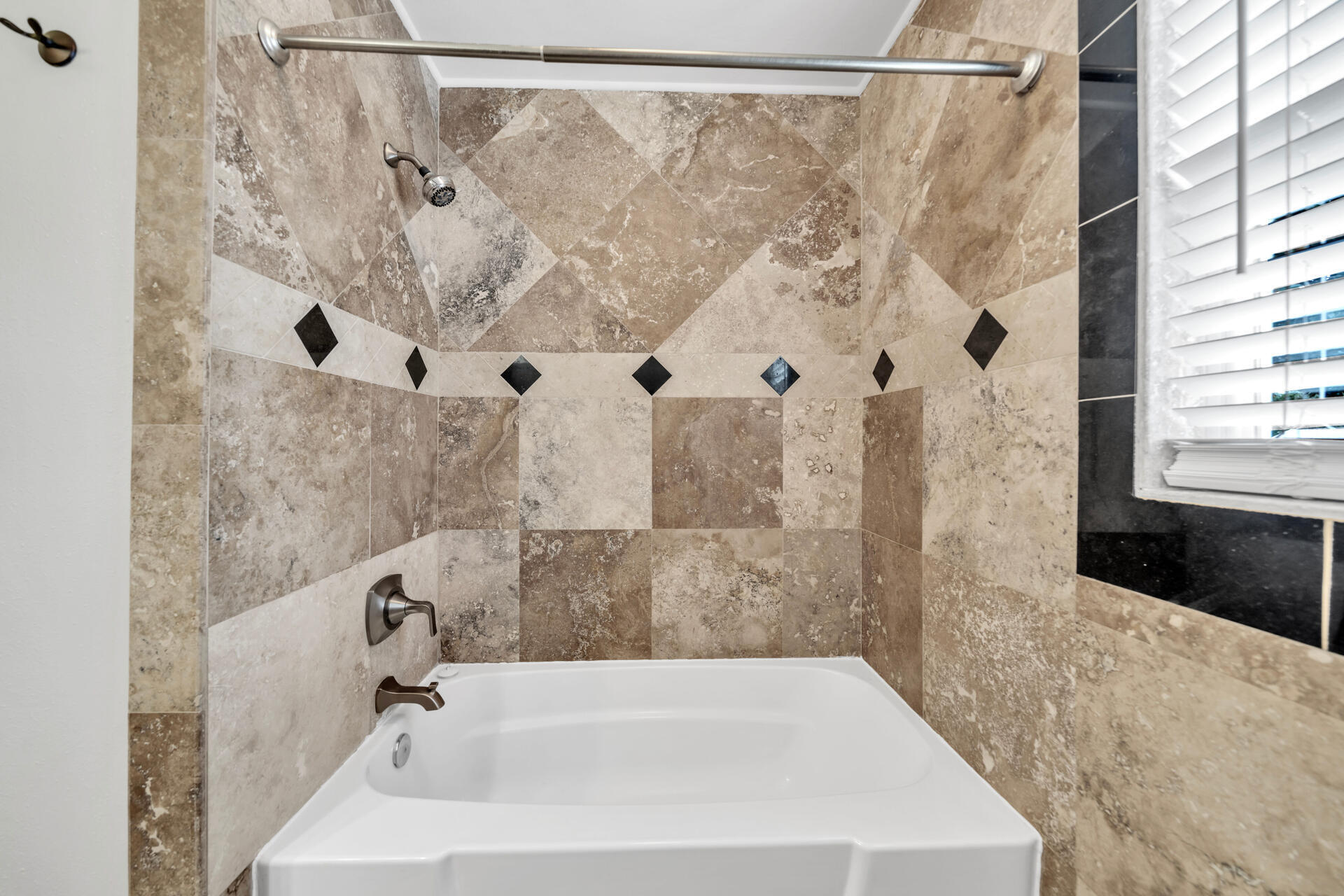 536 Benning Drive Destin, FL 32541 - Photo 37 of 46 a bathroom with a bathtub and shower