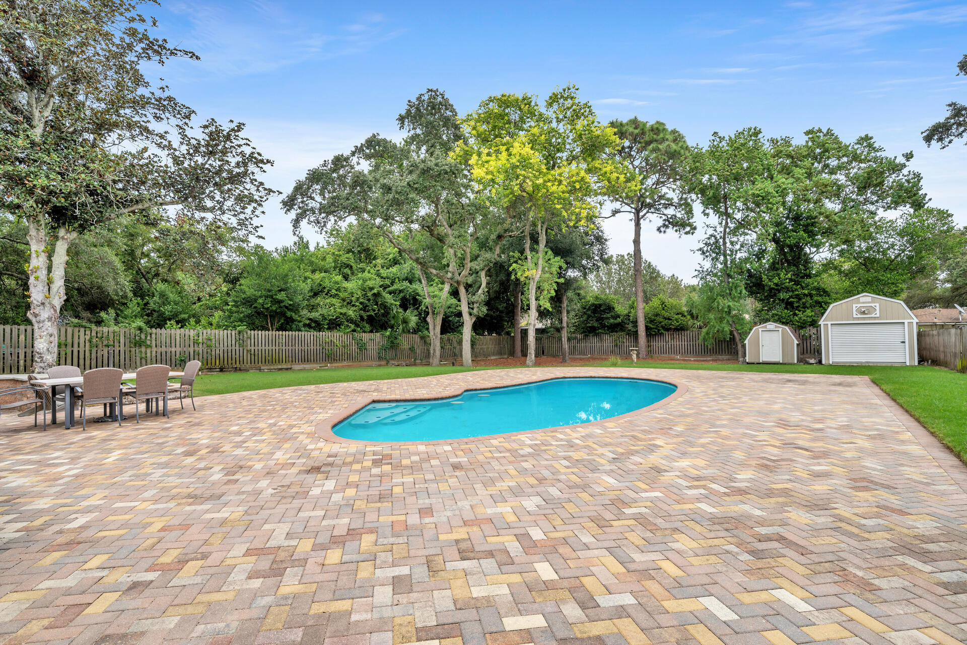 536 Benning Drive Destin, FL 32541 - Photo 42 of 46 a view of a swimming pool with a patio