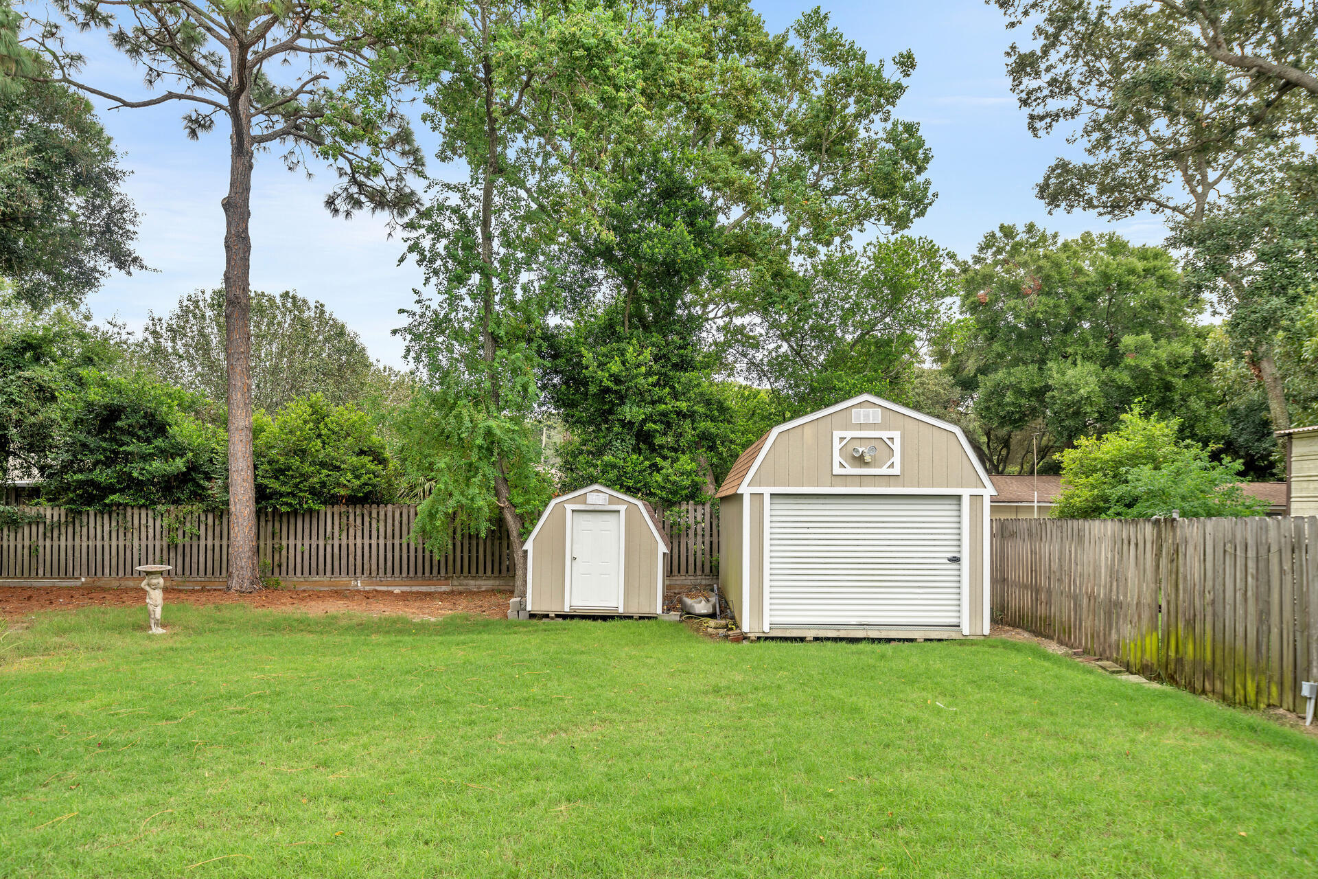 536 Benning Drive Destin, FL 32541 - Photo 43 of 46 a front view of a house with a yard and tree