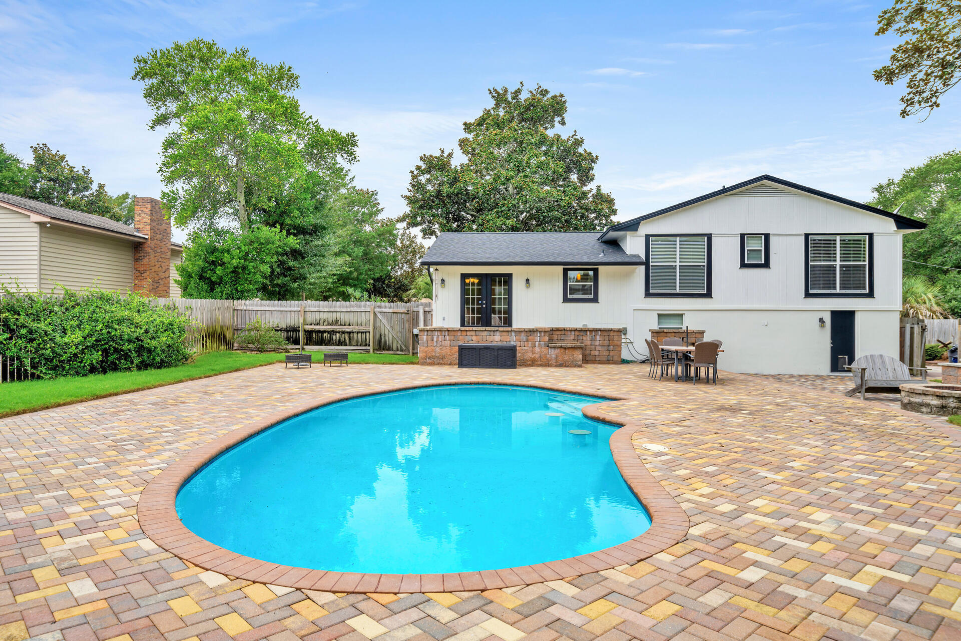 536 Benning Drive Destin, FL 32541 - Photo 44 of 46 a swimming pool with outdoor seating and yard