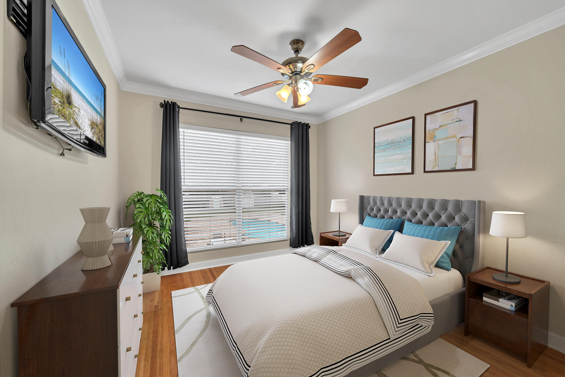 536 Benning Drive Destin, FL 32541 - Photo 8 of 46 a bedroom with a large bed and a chandelier