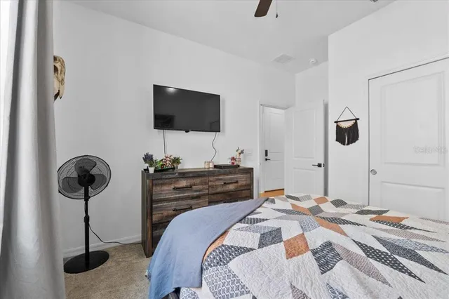 a view of a livingroom with furniture and a rug