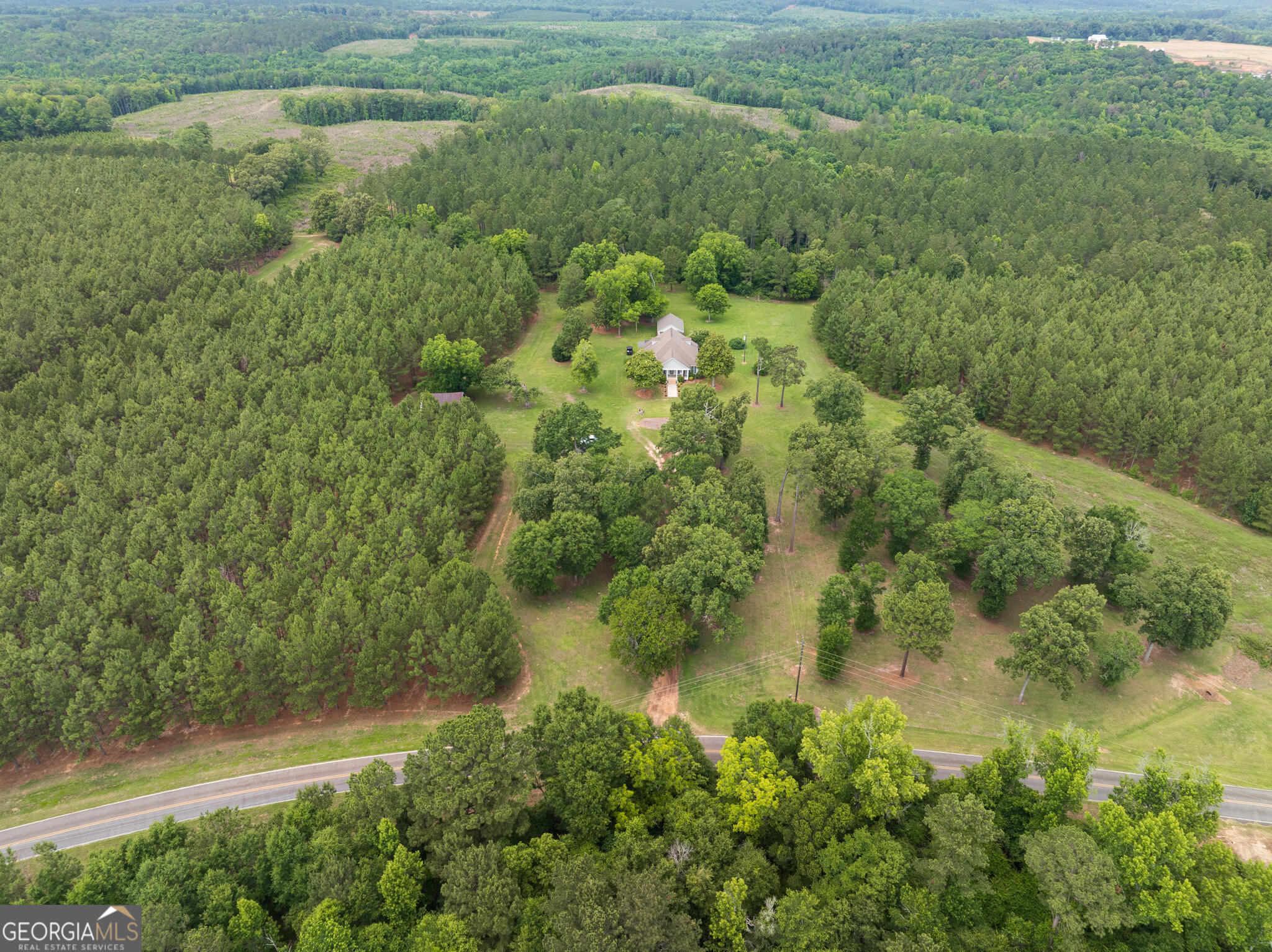 1859 Upper River Road Americus, GA 31709 - Photo 44 of 47 a view of a garden with a lake